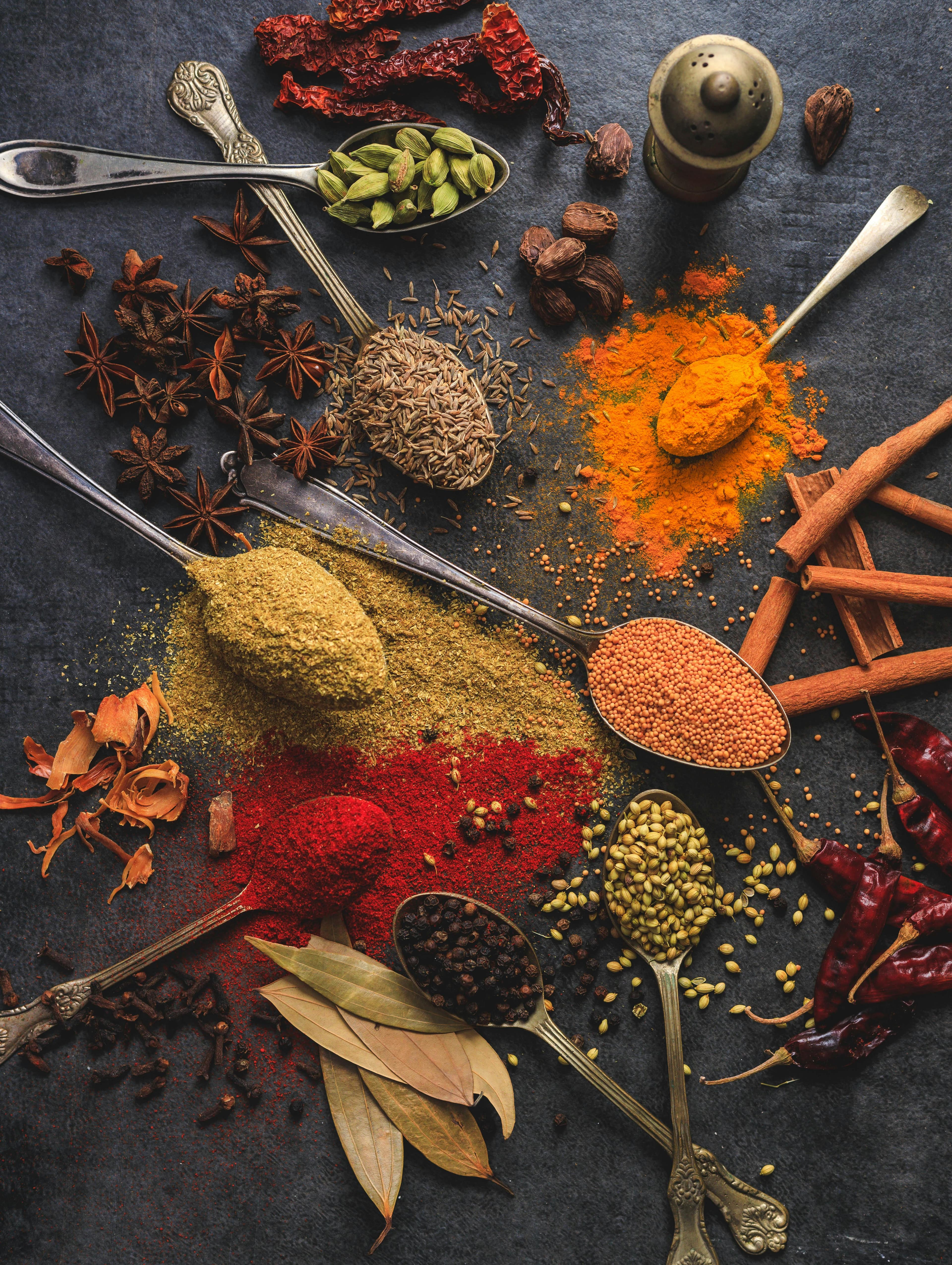 Premium assortment of whole spices styled for wholesale presentation